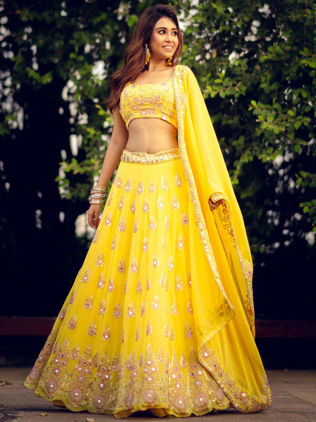 TIKODI Yellow Embroidered Mirror Work Semi-Stitched Lehenga & Unstitched Blouse With Dupatta Price in India