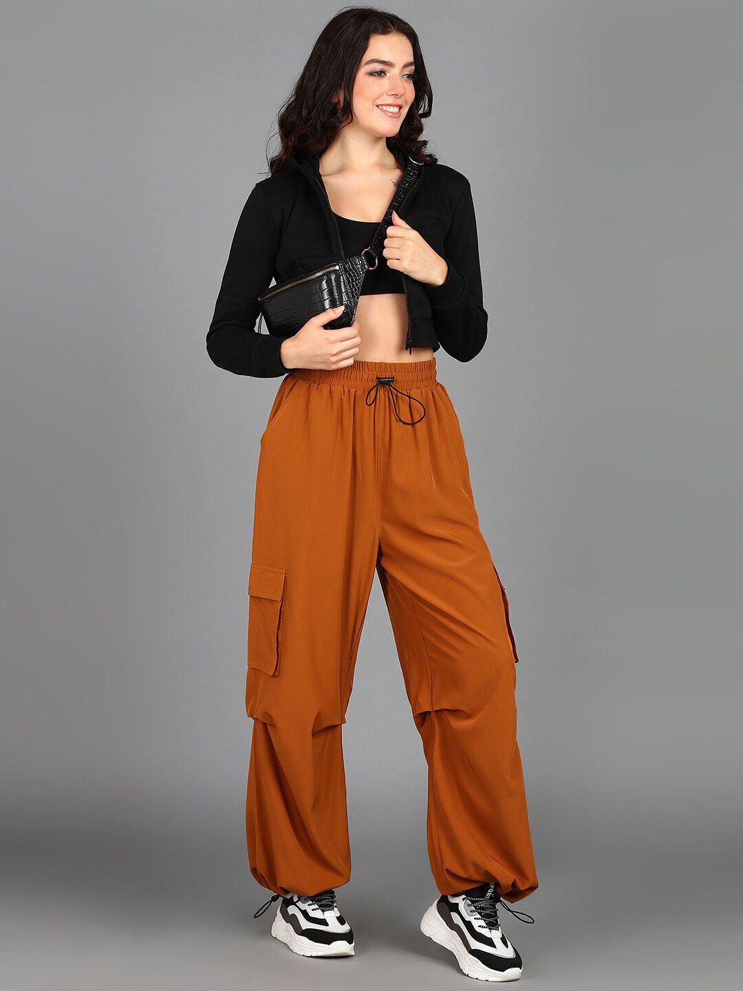 The Roadster Lifestyle Co. Women Rust Mid Rise Plain Baggy Fit Cargos Price in India