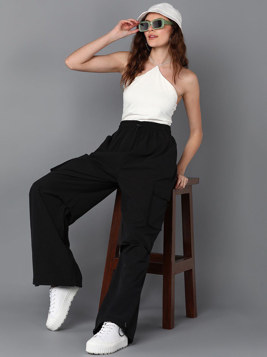 The Roadster Lifestyle Co. Women Black Mid Rise Plain Baggy Fit Cargos Price in India