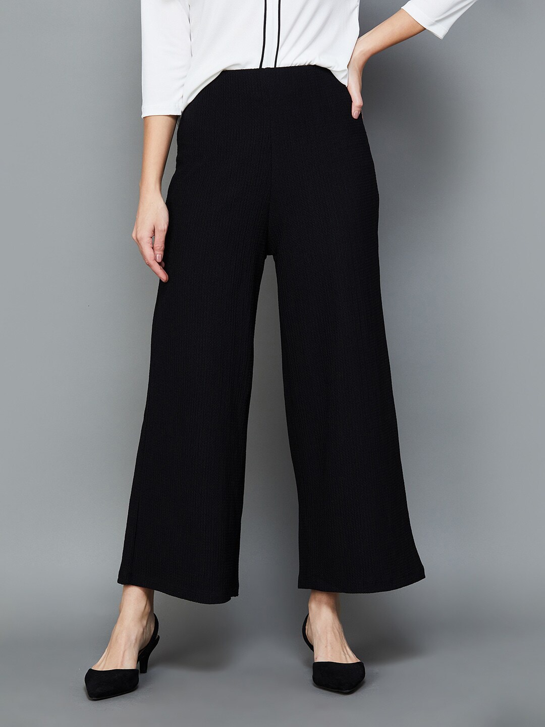 CODE by Lifestyle Mid-Rise Knitted Parallel Trousers Price in India