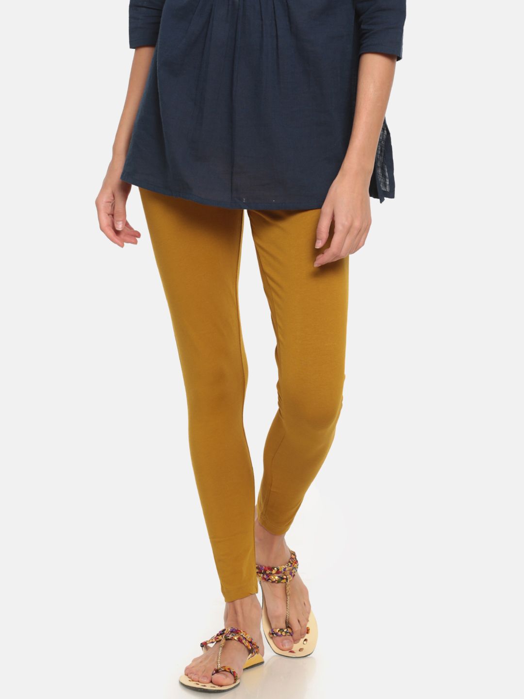 Go Colors Women Mustard Yellow Solid Ankle-Length Leggings Price in India