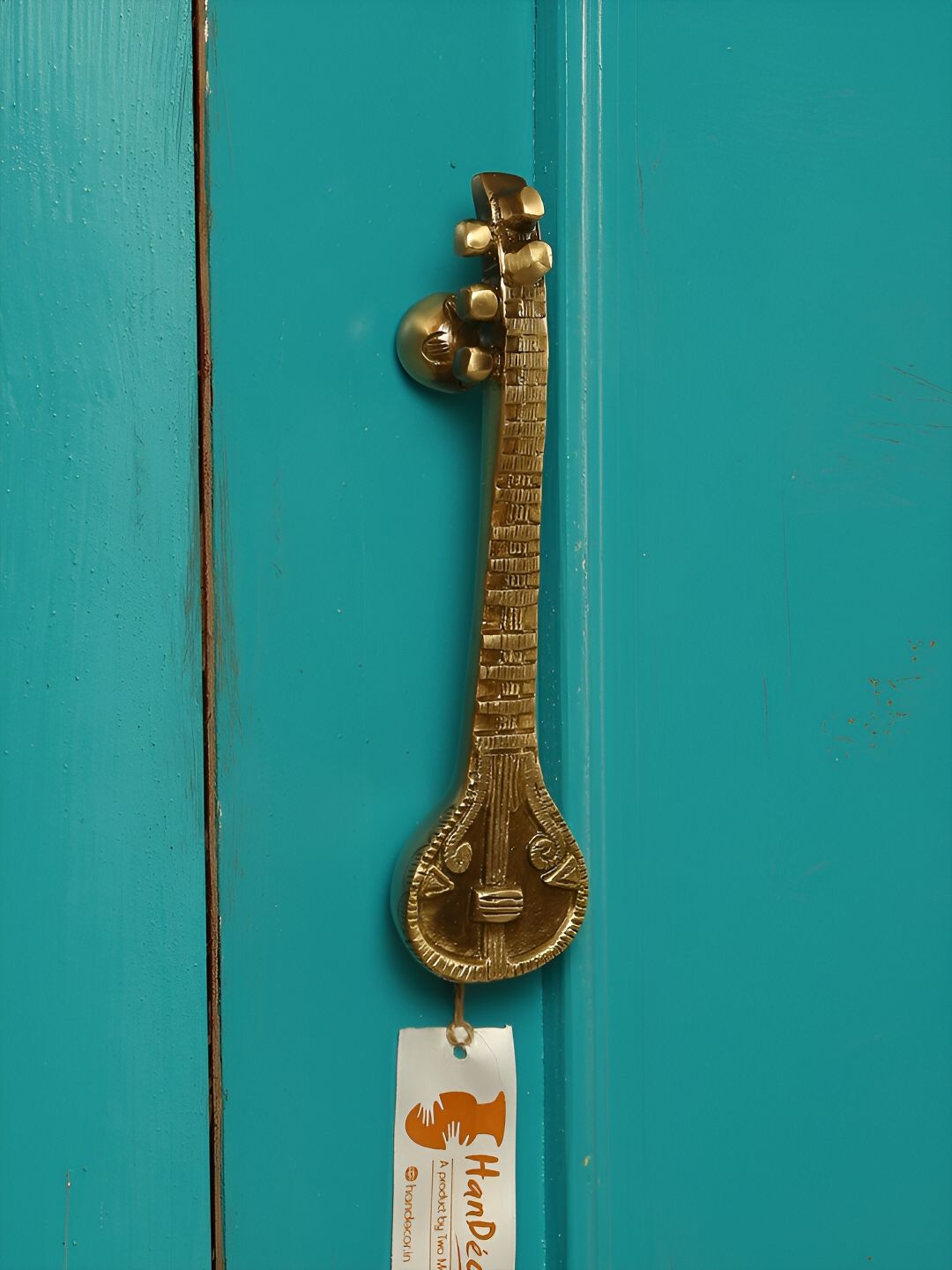 Two Moustaches Gold Toned Sitar Designed Brass Door Handle