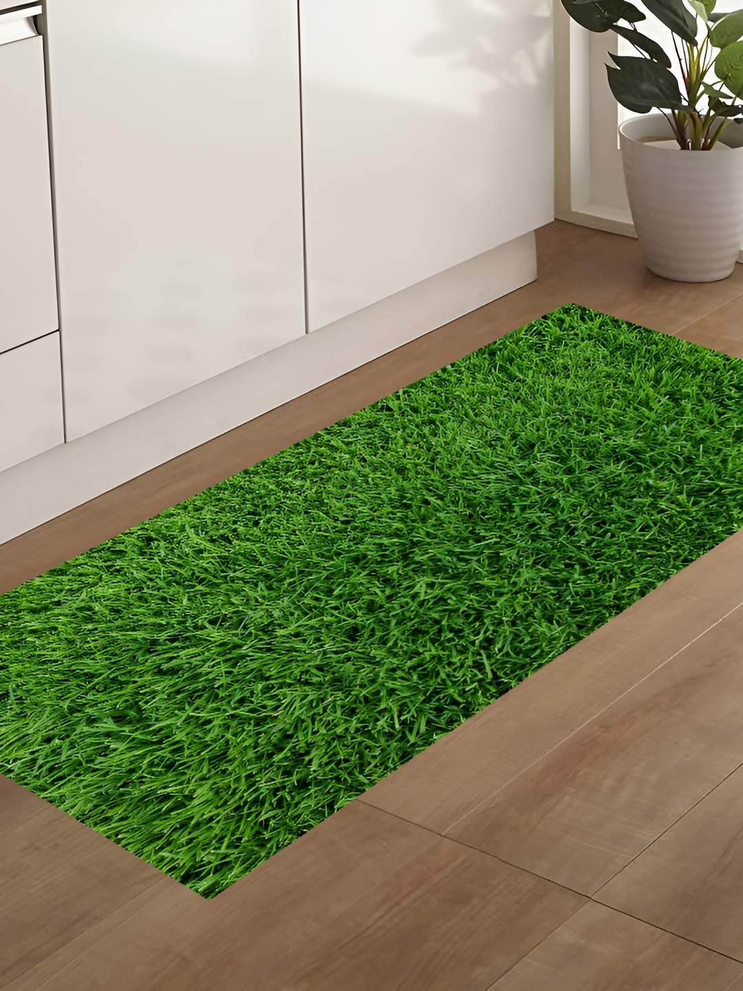 REVEXO Green UV-Resistant Artificial Grass Floor Mat deal from myntra
