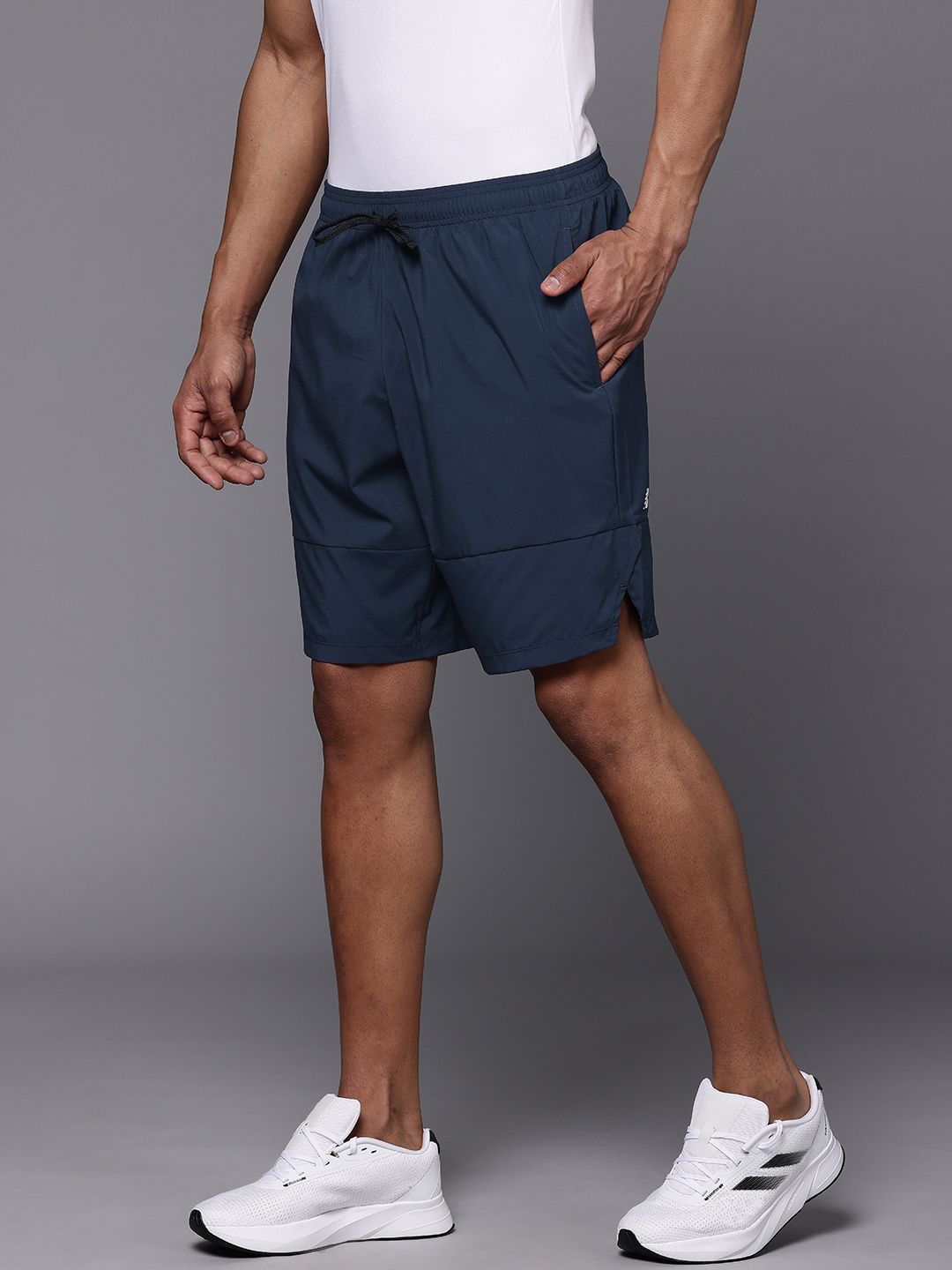 Buy New Balance Men Fast Drying Tenacity 9 Inch Woven Sports