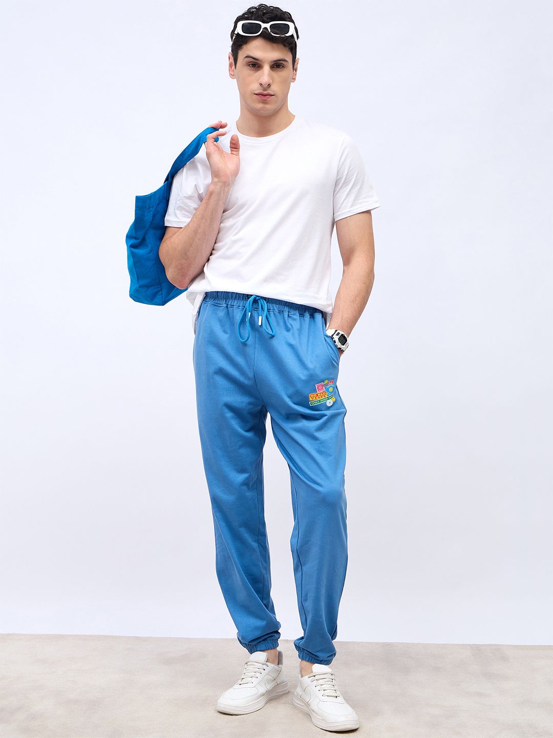 Styli Men Blue Graphic Badge Printed Oversize Fit Mid-Rise Pure Cotton Oversized Joggers