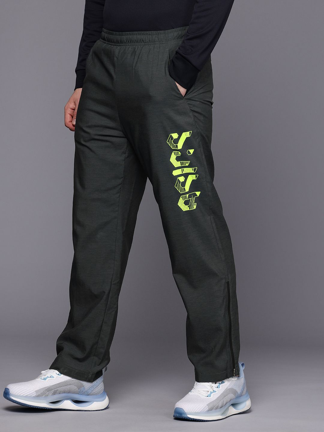 Buy ASICS Men Brand Logo Graphic Printed Water Repellent Woven