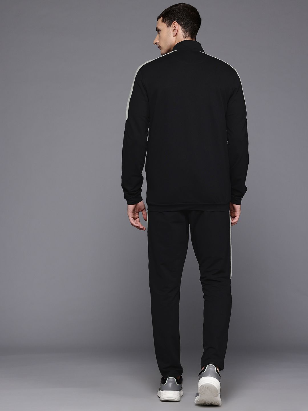 Buy ASICS Mock Collar Striped Detail Sports Tracksuit - Tracksuits