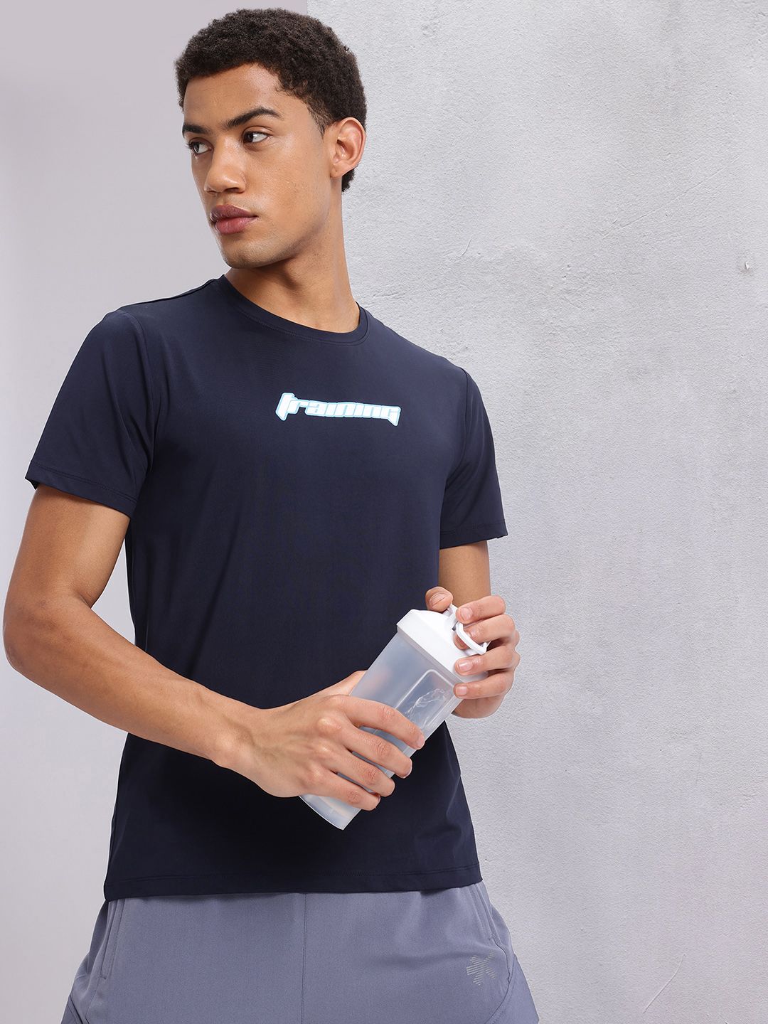HRX by Hrithik Roshan Solid Running T-shirt with Typography Detail
