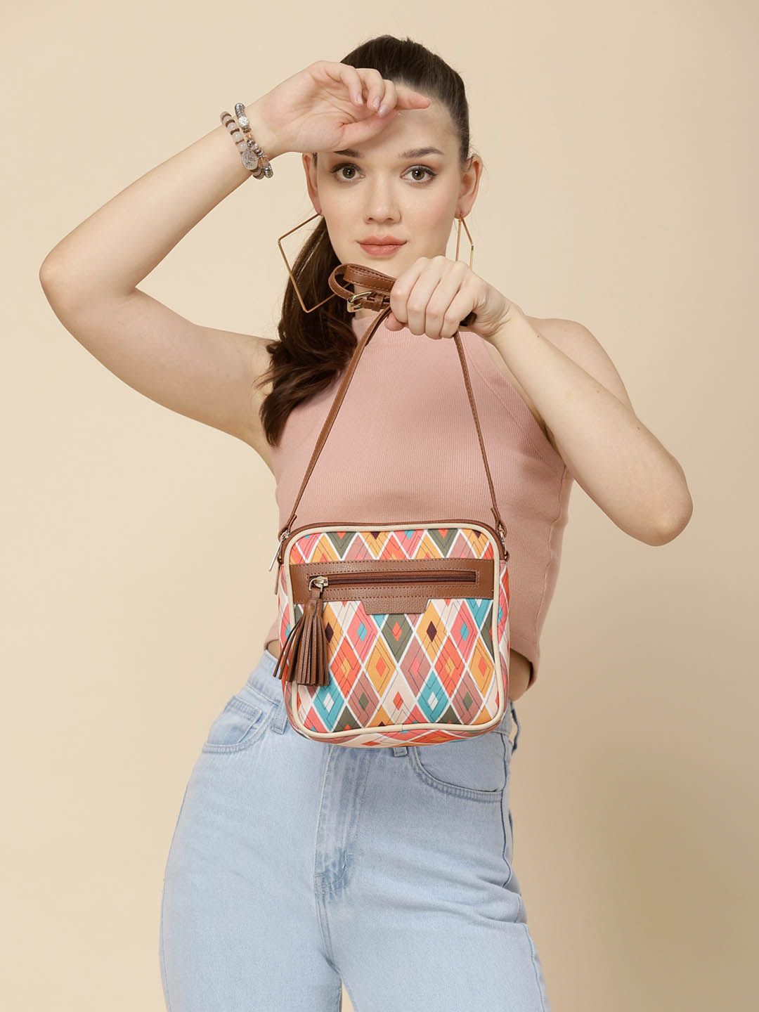 Sangria Women Abstract Printed Structured Zip Detail Sling Bag deal from myntra