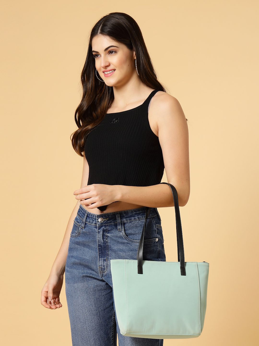 DressBerry Women Textured Solid Structured Shoulder Bag deal from myntra