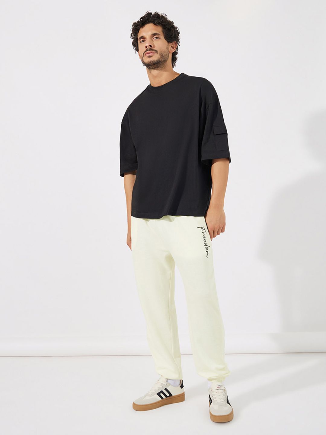 Styli Men Cream-Coloured Mid-Rise Oversized Fit Joggers