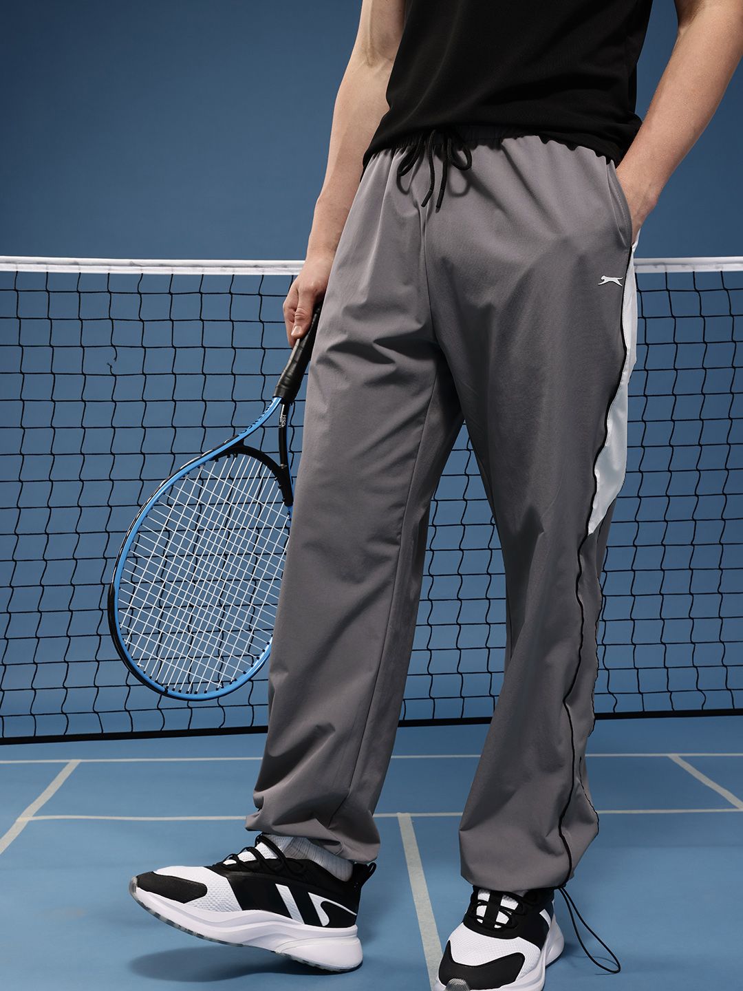 Buy Slazenger Men Regular Fit Toggle Hem Side Striped Track Pants