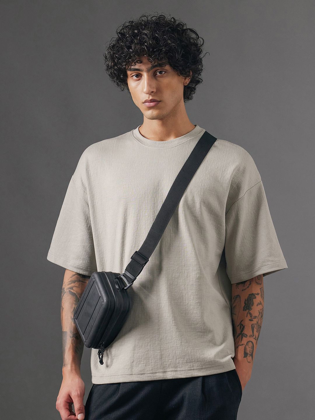 RARE RABBIT Men Solid Round Neck Cotton Oversized T-shirt deal from myntra