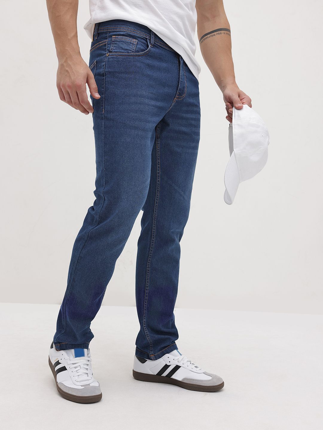 The Roadster Life Co. Men Light Fade Mid-Rise Stretchable Slim Fit Jeans