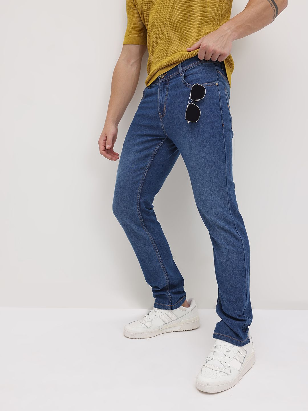The Roadster Life Co. Men Light Fade Mid-Rise Stretchable Slim Fit Jeans
