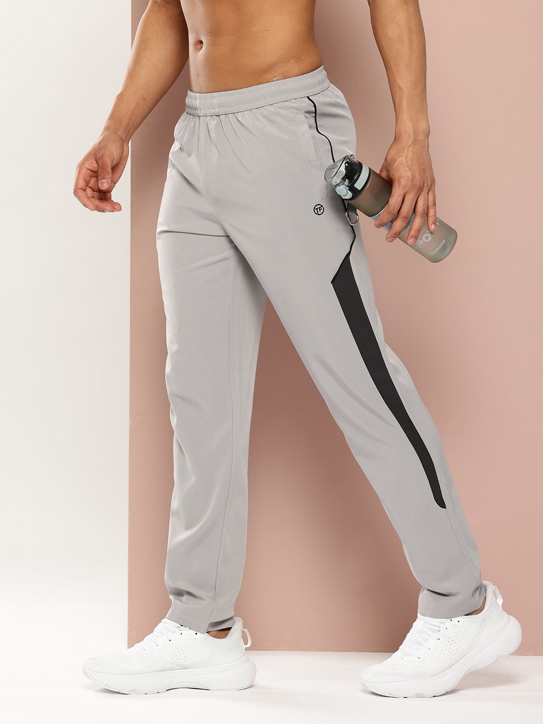 TURNFIT Men Straight Fit Gym Track Pants With Side Striped Detail