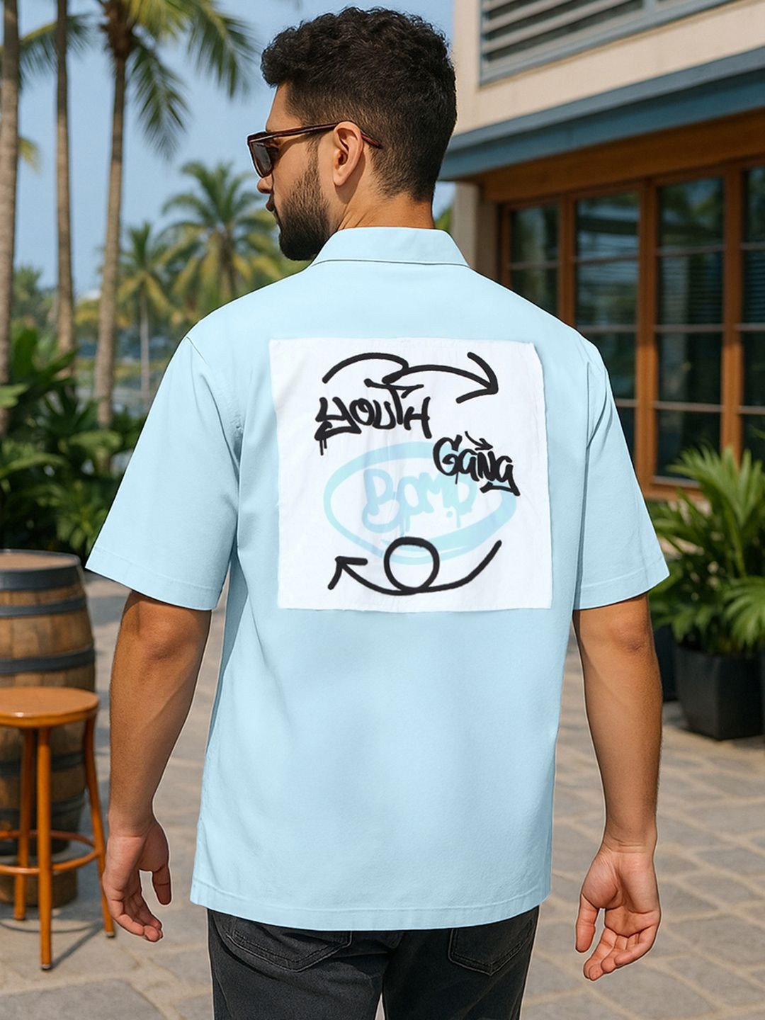 Bewakoof Men's Light Blue Youth Gang Graphic Printed Oversized Shirt