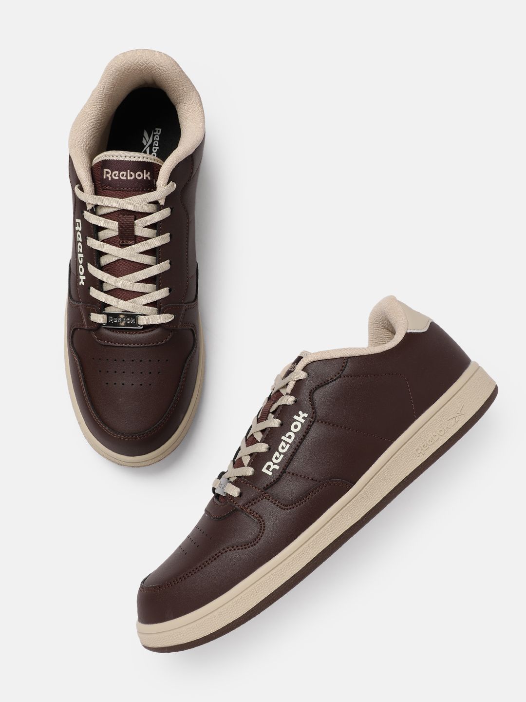 ra-11957 Buy Reebok Unisex Perforated Courtswift Duelist Sneakers - Casual