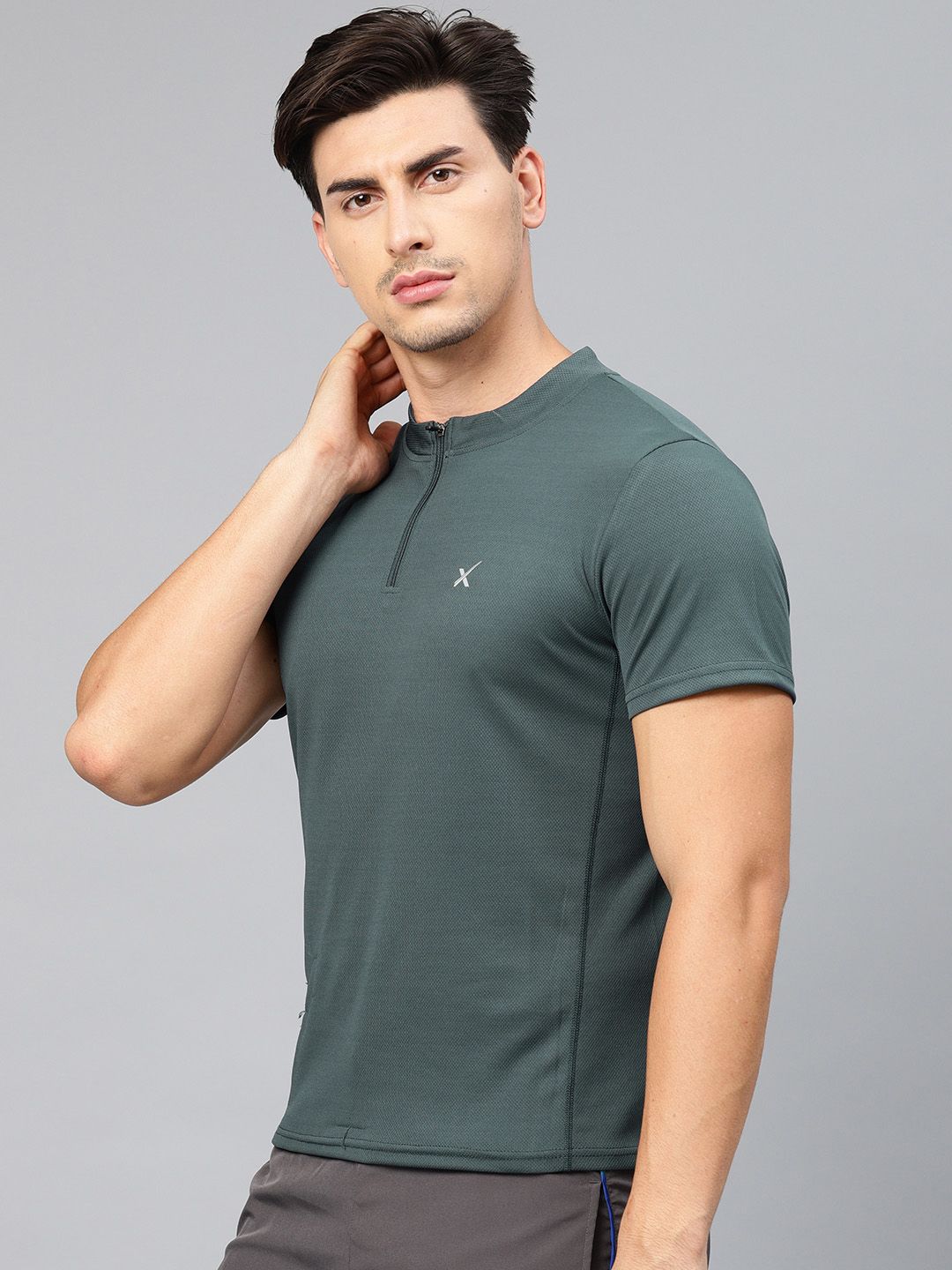 Buy HRX by Hrithik Roshan Men Blue Half Zipper Rapid Dry Cycling T