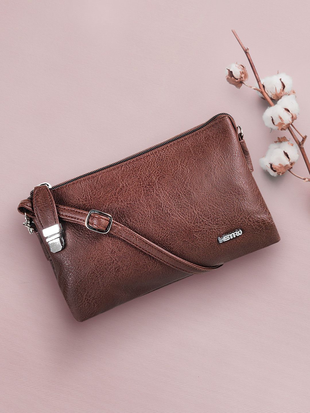 Metro Brown Solid Sling Bag Price in India