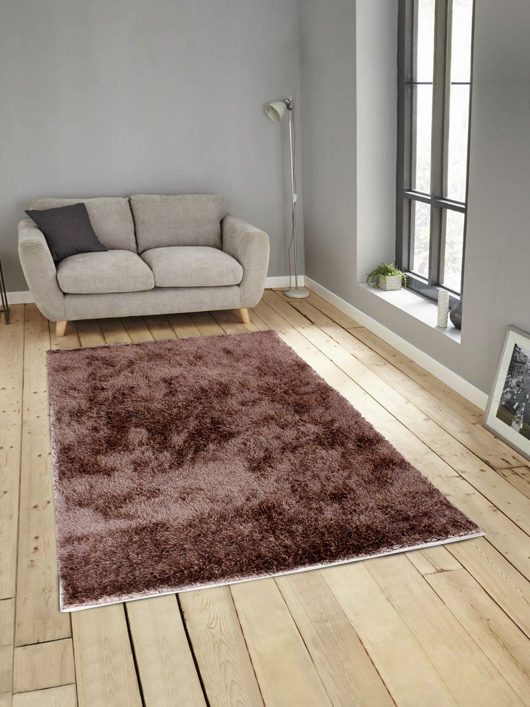 ROMEE Brown Solid Carpet Price in India