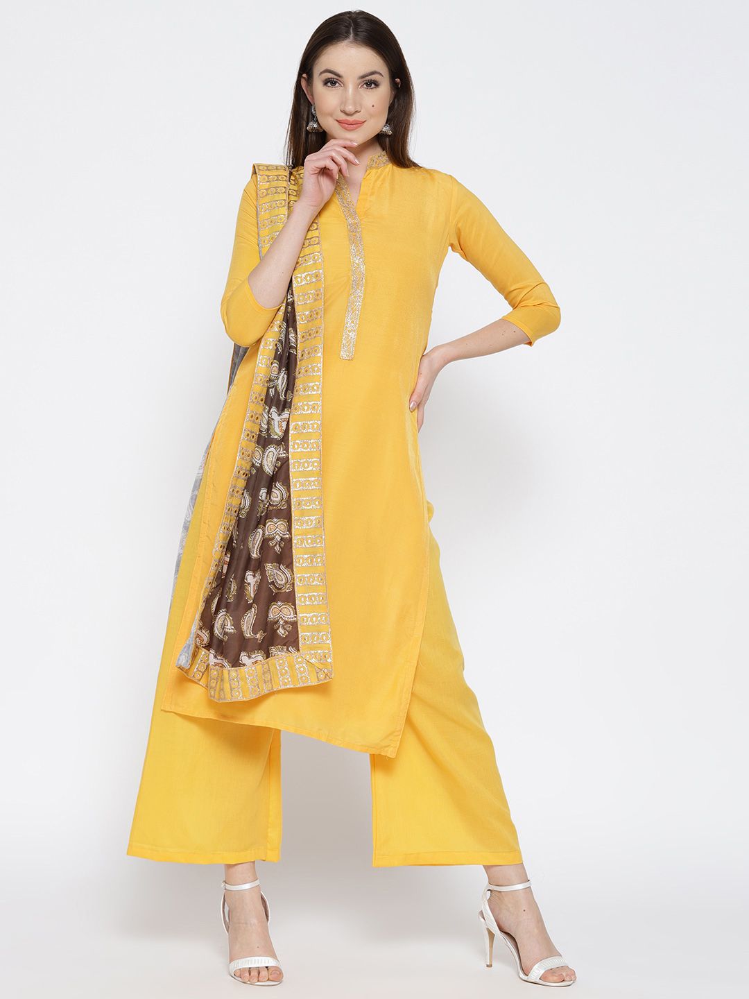 Saree mall Yellow Solid Semi-Stitched Dress Material Price in India