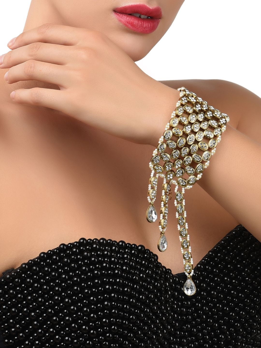 Zaveri Pearls Off-White Antique Gold-Plated Link Bracelet Price in India