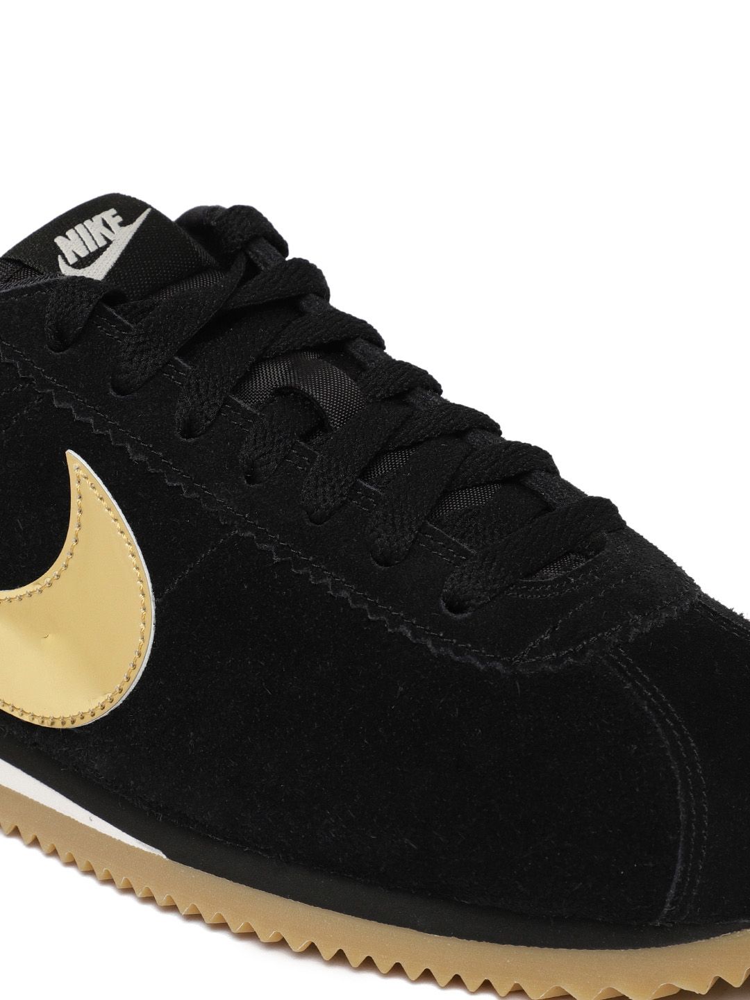 nike black & gold cortez suede trainers
