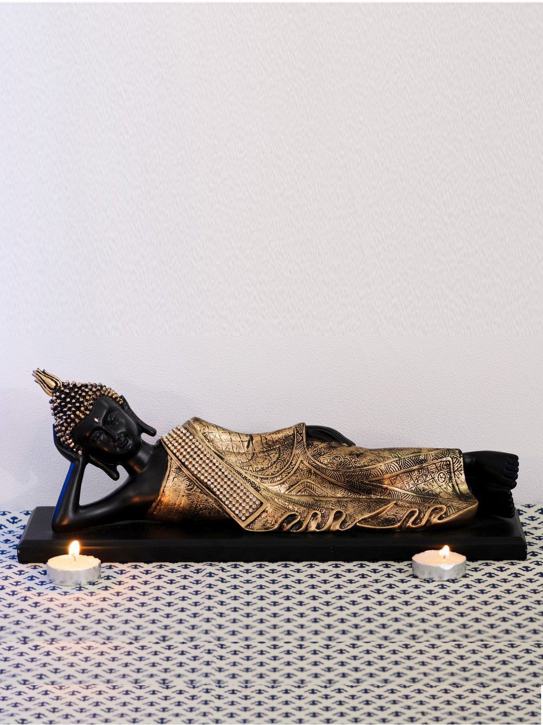 eCraftIndia Gold-Toned & Black Polyresin Handcrafted Resting Buddha Price in India