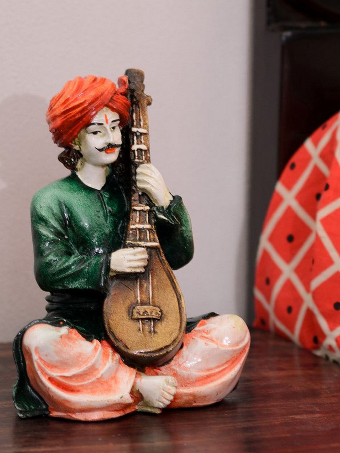 eCraftIndia Green & Pink Polyresin Rajasthani playing Sitar musical instrument Price in India