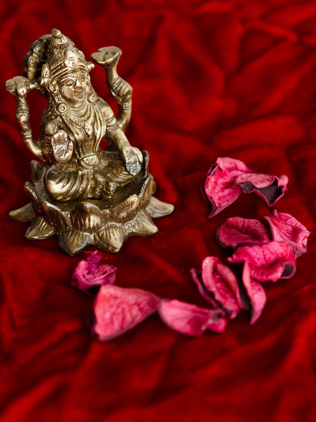 eCraftIndia Gold-Toned Antique Finish Handcrafted Brass Goddess Laxmi on Lotus Price in India