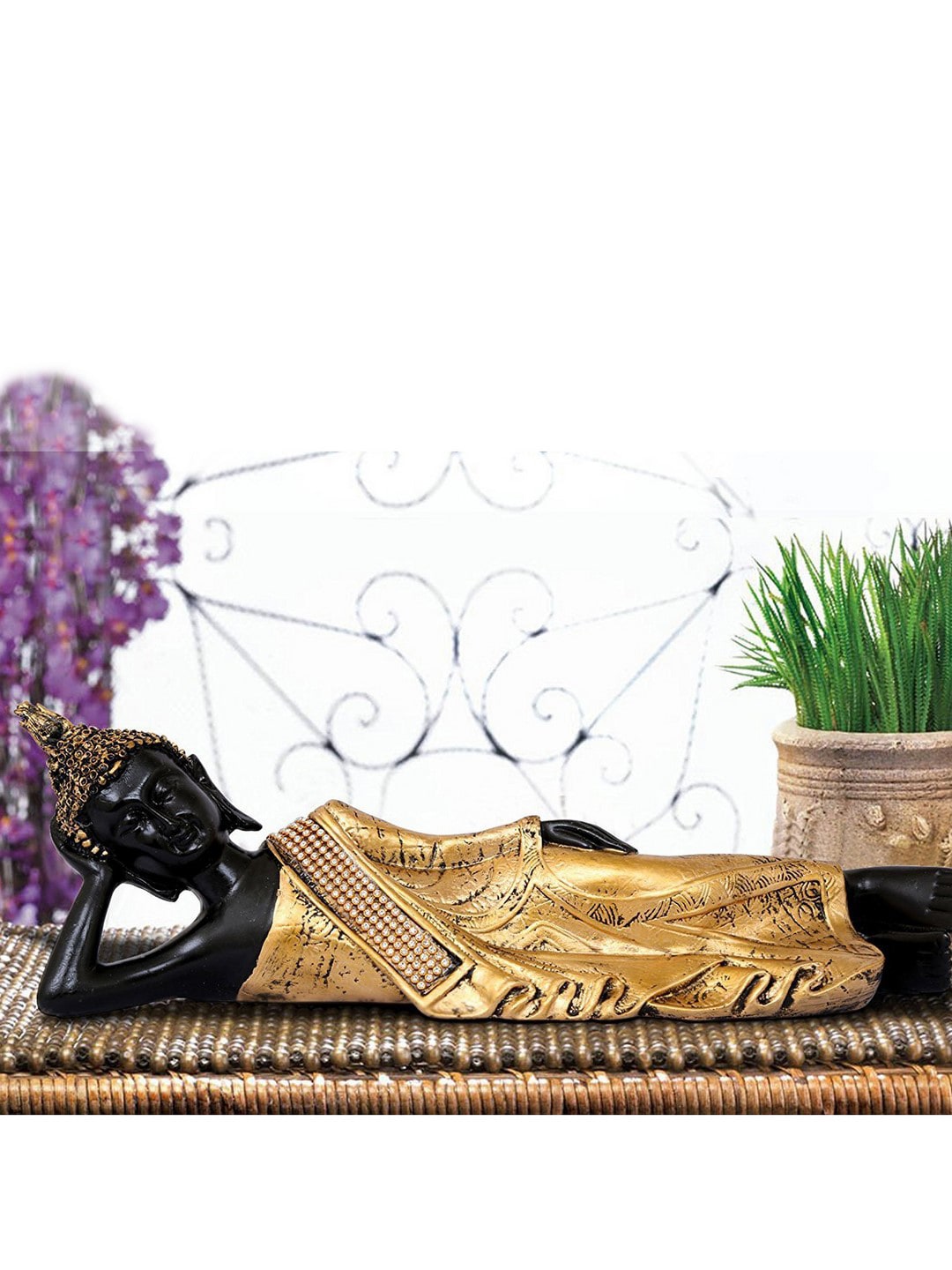 eCraftIndia Gold-Toned & Black Handcrafted Decorative Reclining Lord Buddha Idol Price in India