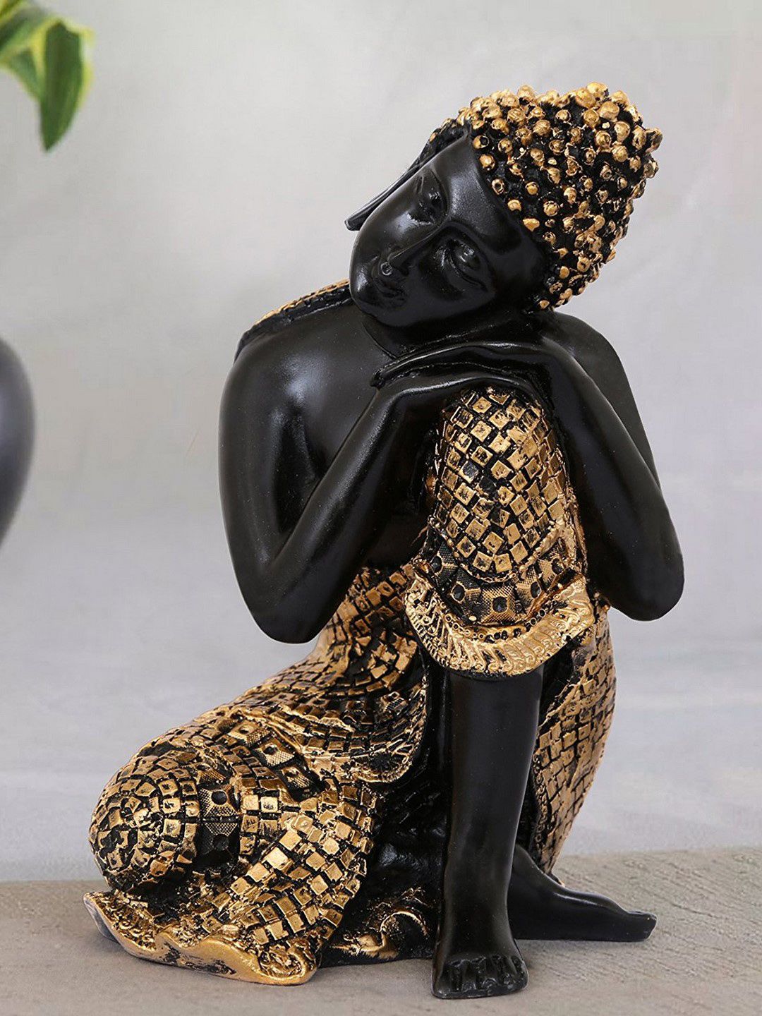 eCraftIndia Gold-Toned & Black Resting Buddha on Knee Idol Price in India