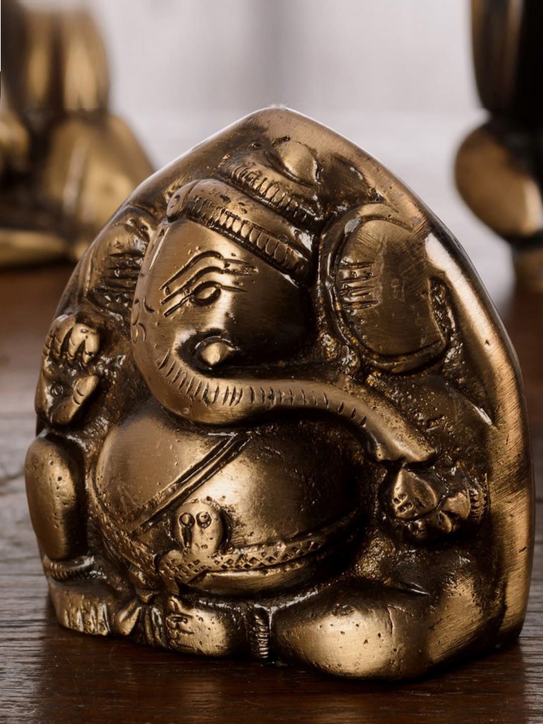 eCraftIndia Gold-Toned Handcrafted Brass Antique Finish Two-Faced Lord Ganesha Price in India