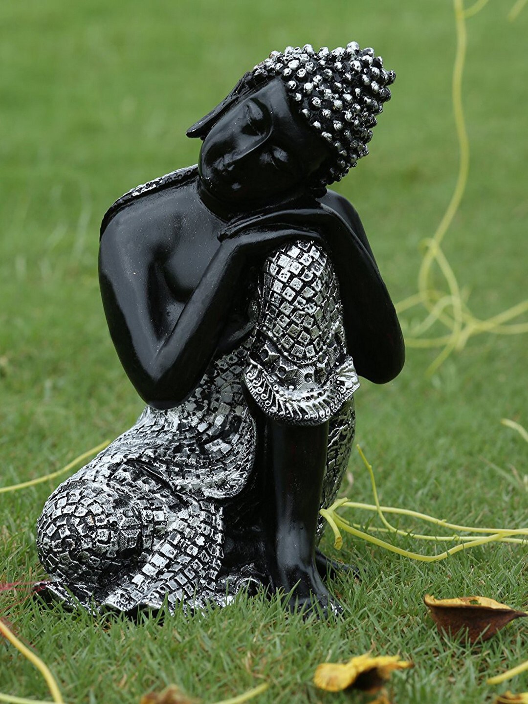 eCraftIndia Silver-Toned & Black Resting Buddha on Knee Idol Price in India