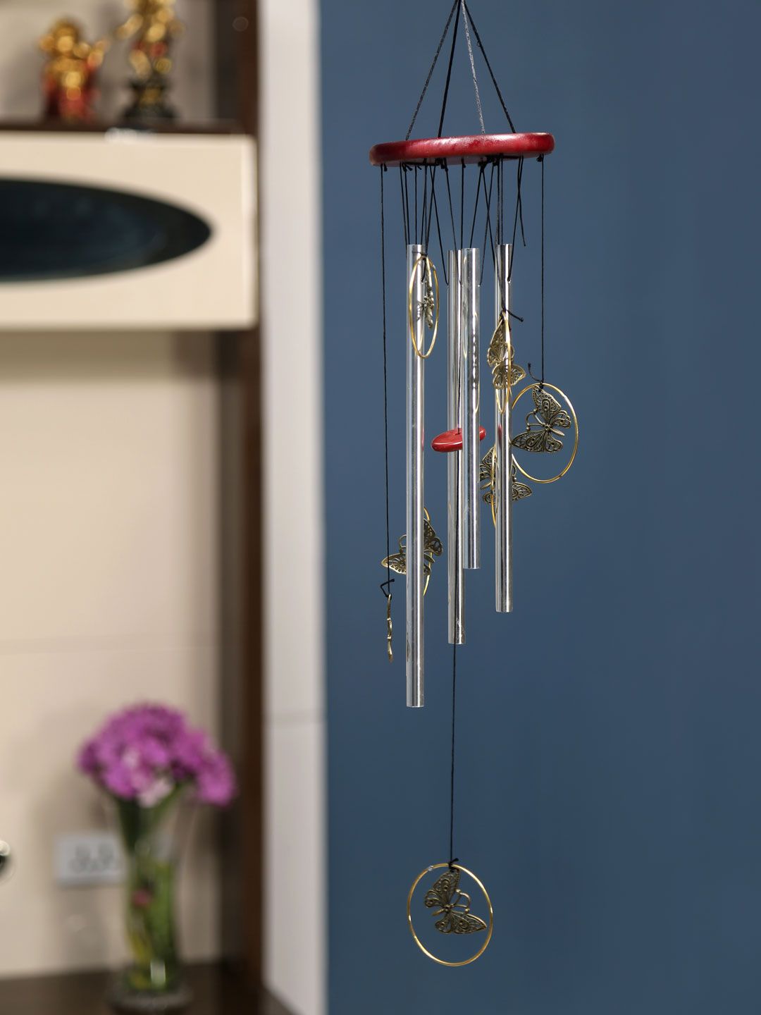 Athome by Nilkamal Silver-Toned & Maroon Windchime Price in India