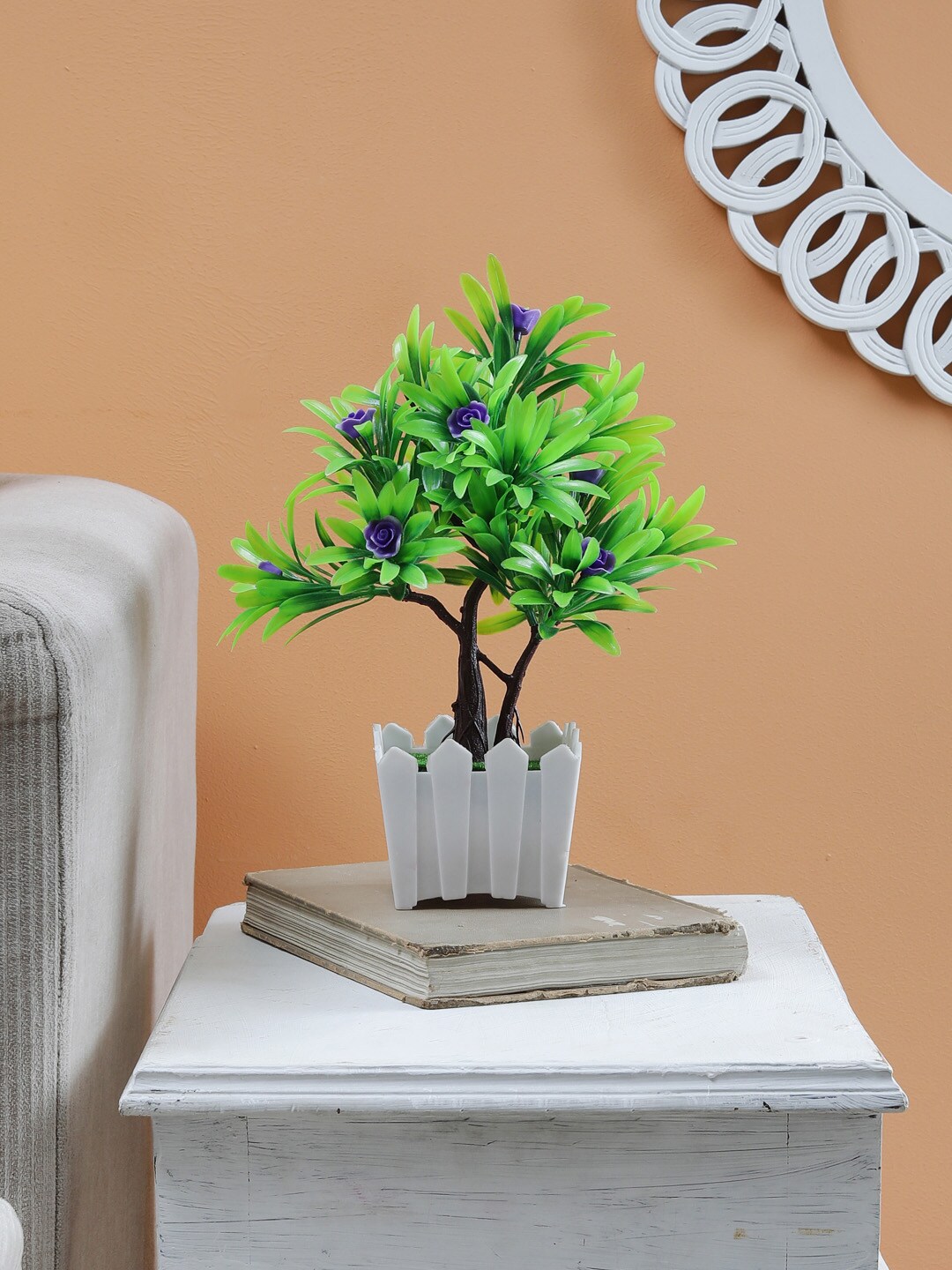 Foliyaj S Shaped Bonsai Tree With Green Leaves and Small Purple Flowers in Brown Pot Price in India