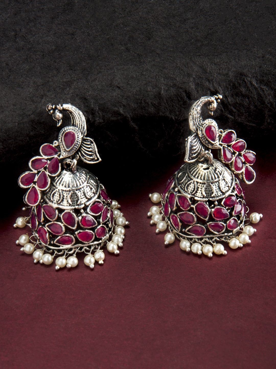 Rubans Oxidised Silver-Toned & Red Handcrafted Dome-Shaped Jhumkas Price in India