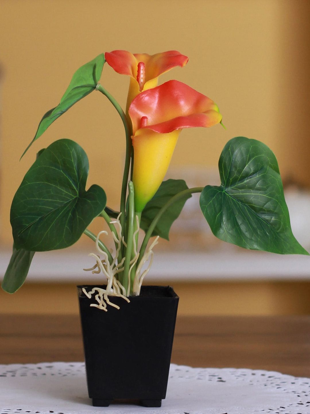Fourwalls Set Of 2 Orange Artificial Calla Lily Flower Plants in a Melamine vase Price in India