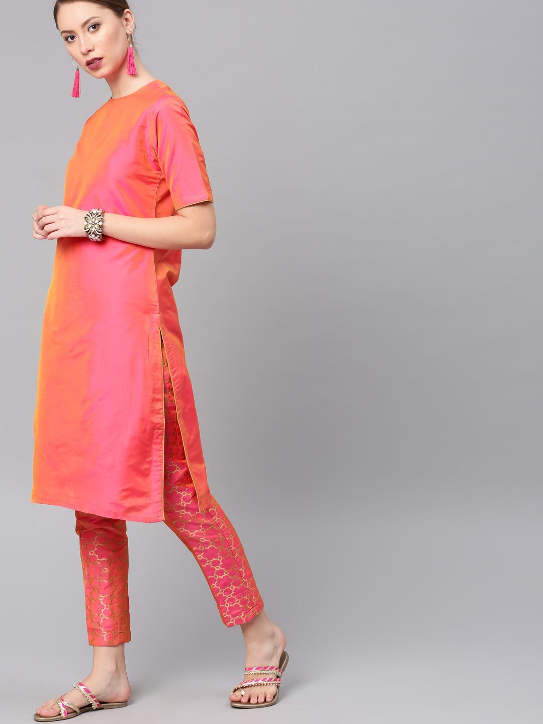 Vishudh Women Pink & Gold-Toned Solid Kurta With Self Designed Trousers Price in India