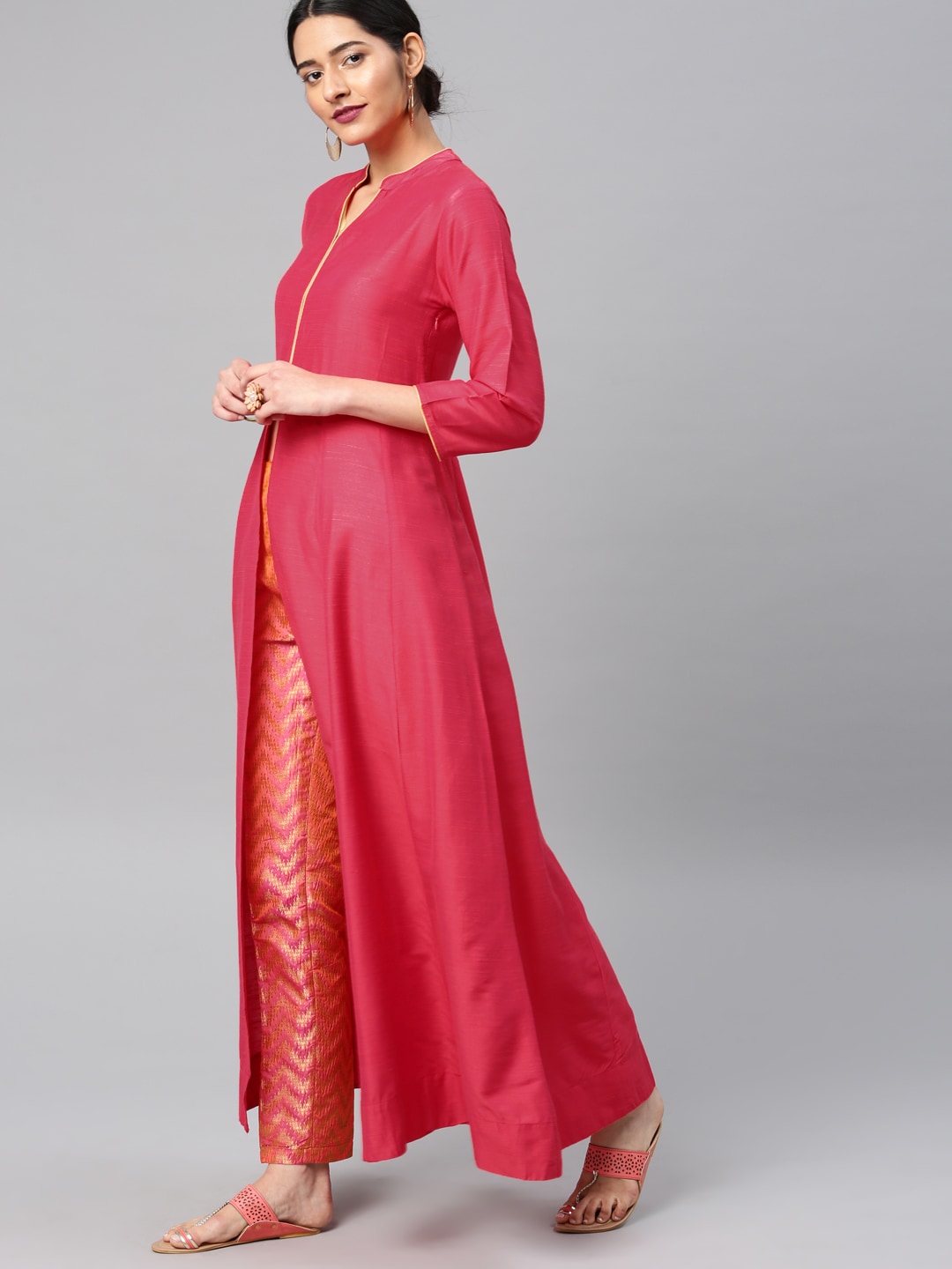 Vishudh Women Pink Solid Kurta with Trousers Price in India