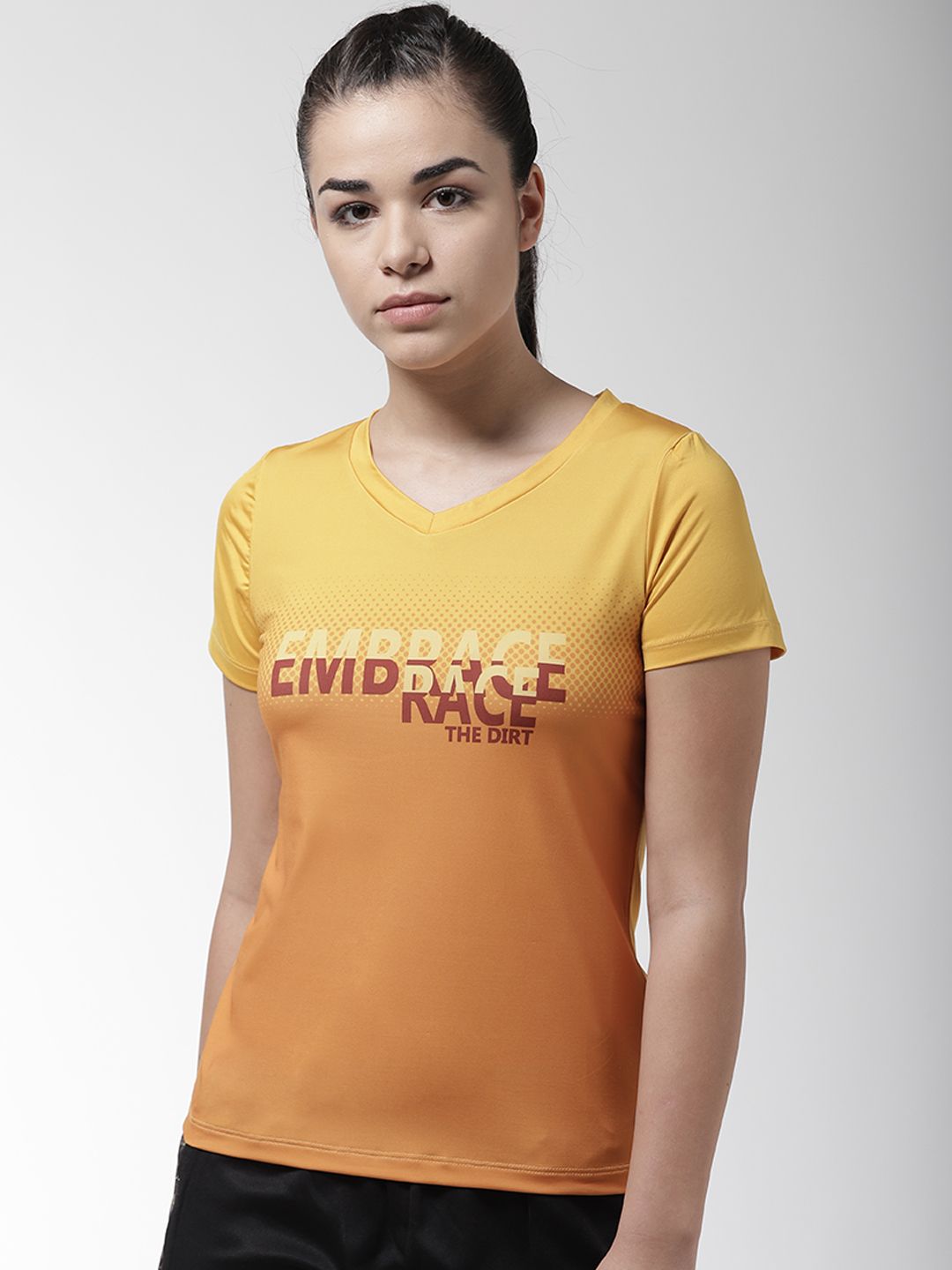 Alcis Women Mustard Yellow Printed V-Neck Running T-shirt Price in India