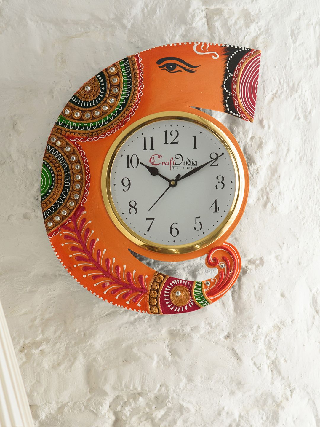 eCraftIndia White & Orange Handcrafted Abstract Shaped Embellished Analogue Wall Clock Price in India