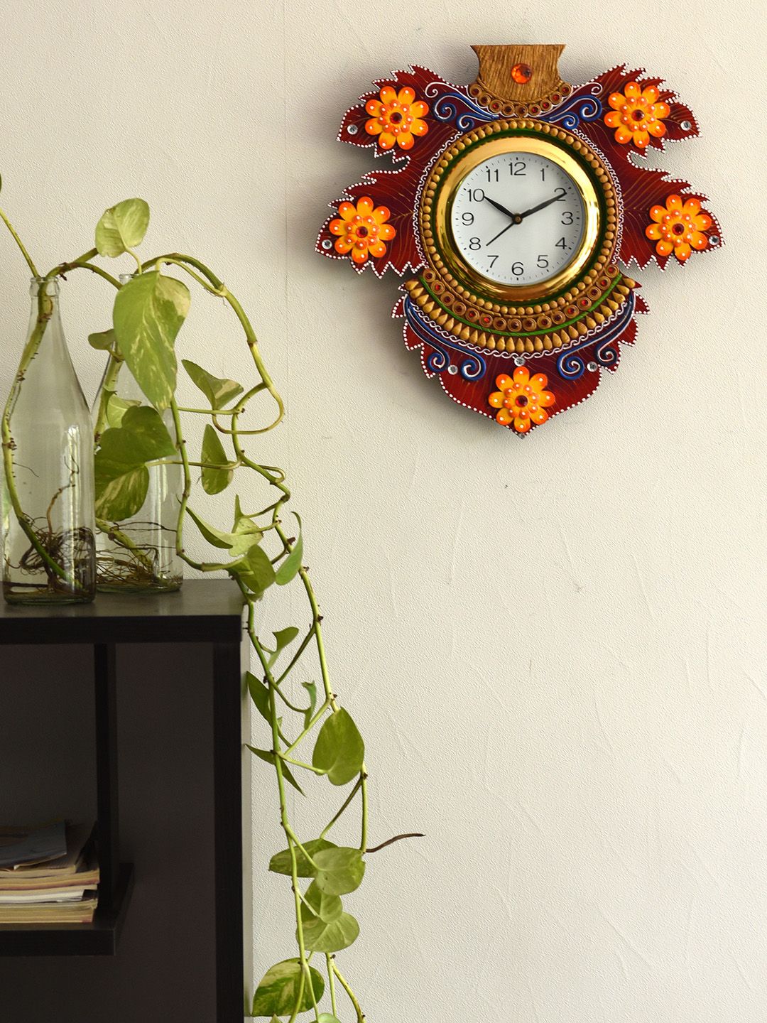 eCraftIndia White Handcrafted Floral Solid Analogue Wall Clock Price in India
