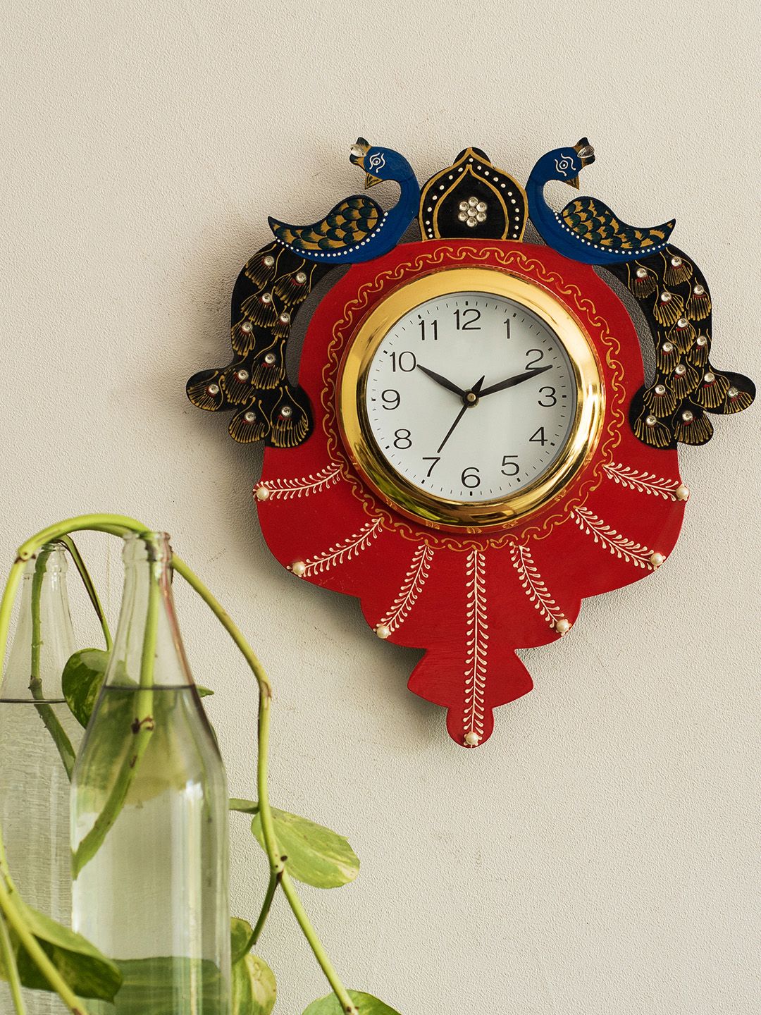 eCraftIndia White & Red Handcrafted Quirky Embellished Analogue Wall Clock Price in India