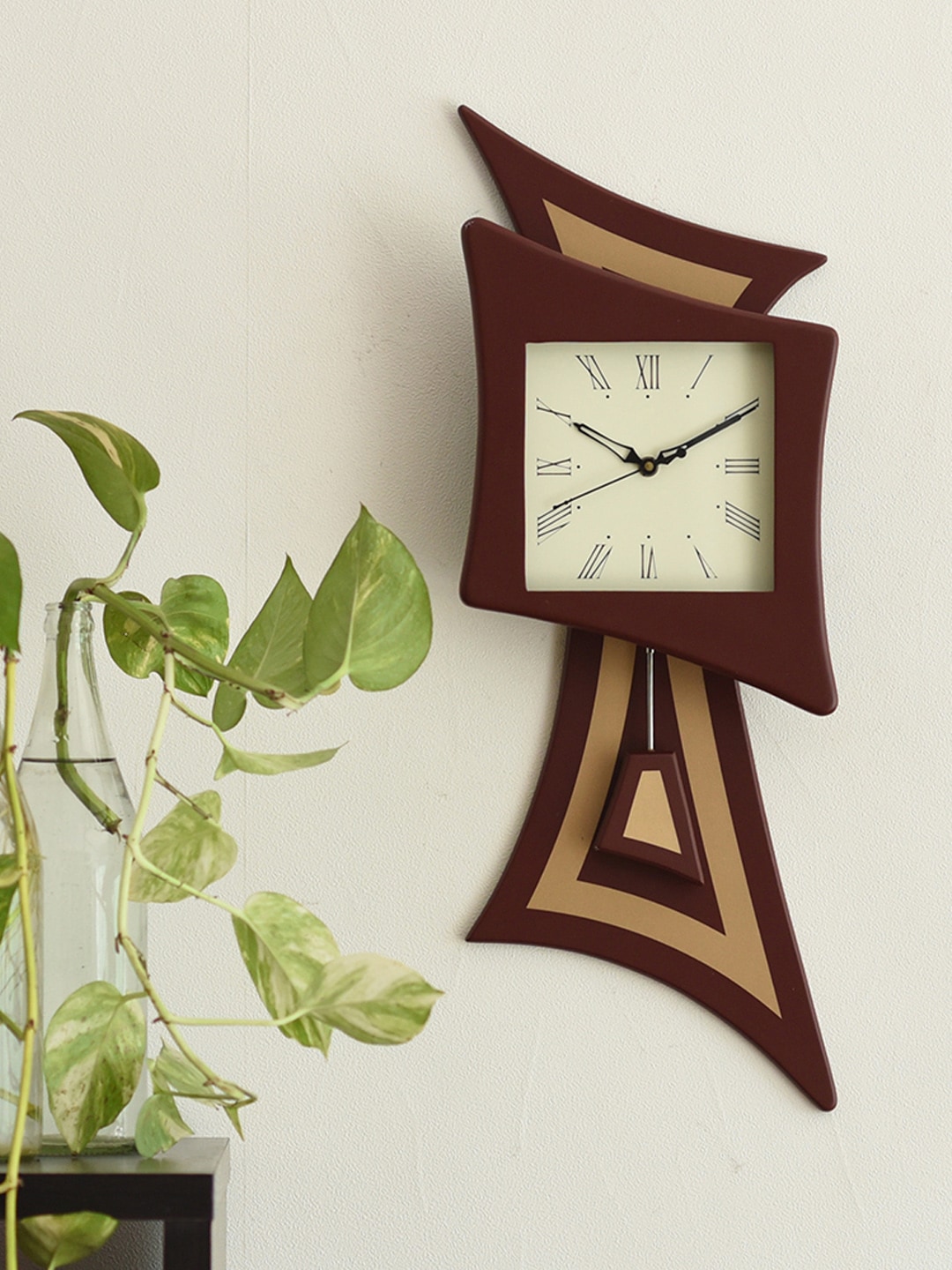 eCraftIndia White & Brown Handcrafted Abstract Shaped Solid Analogue Wall Clock Price in India