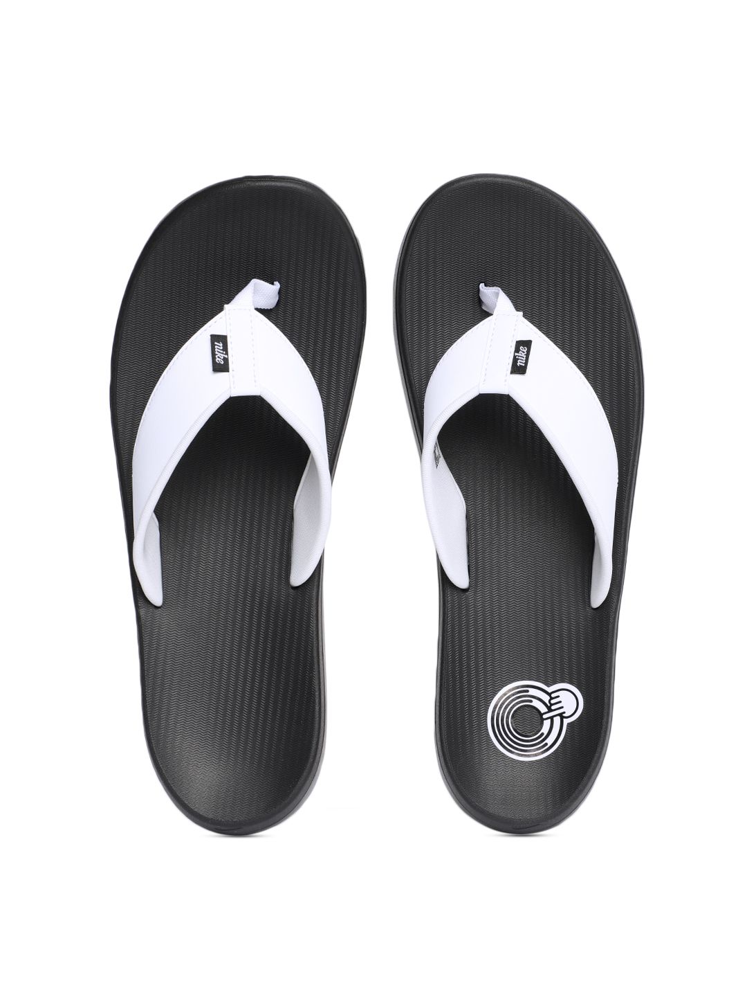 gray nike flip flops