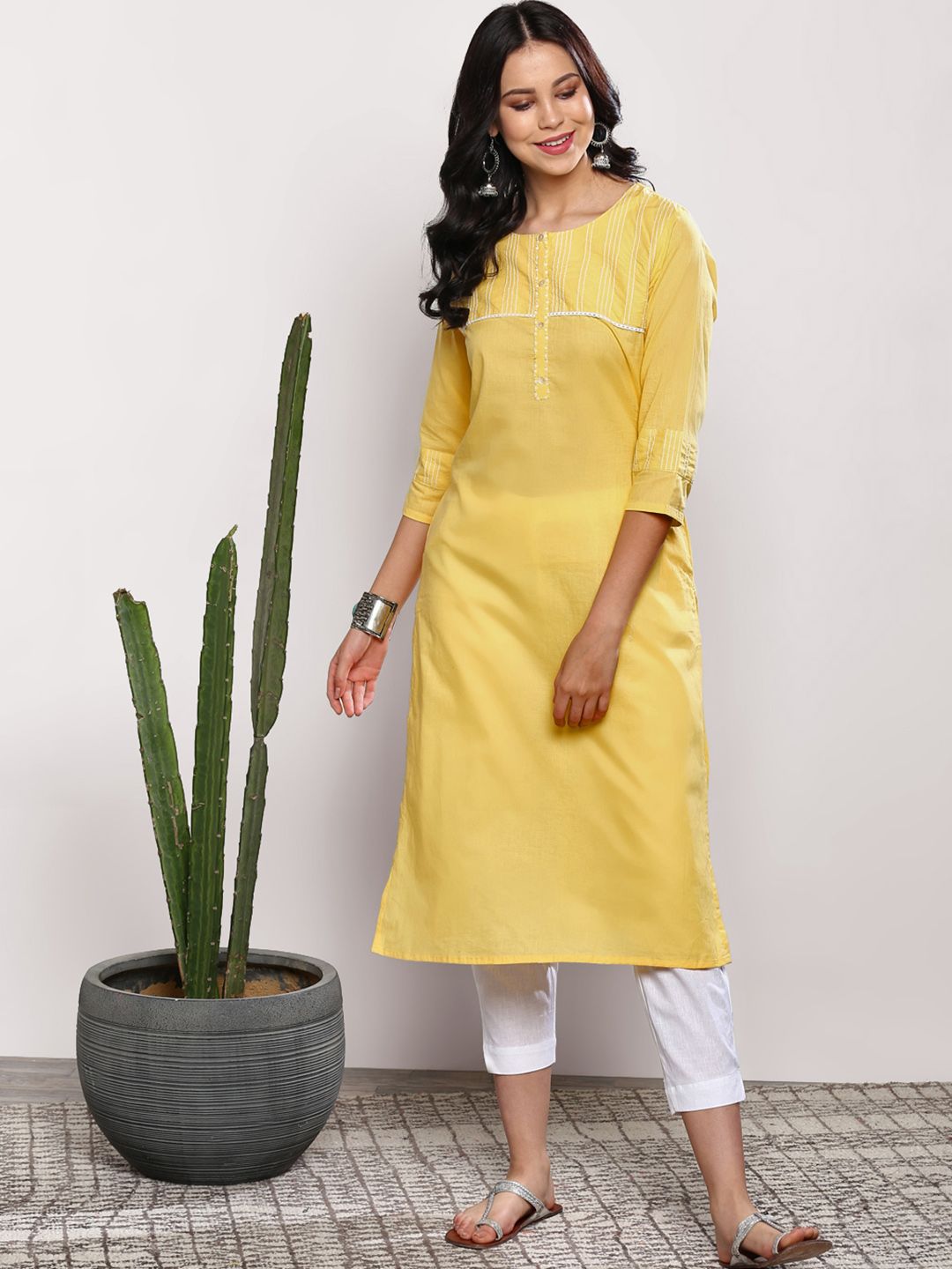 Sangria Women Yellow & White Solid Kurta with Crop Trousers Price in India