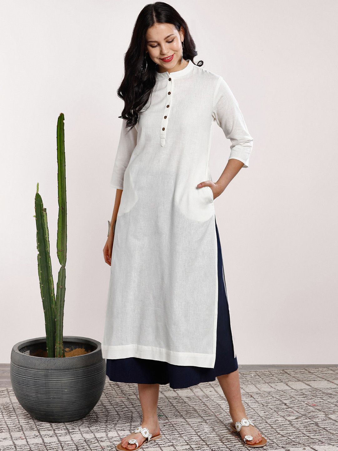 Sangria Women Off-White & Navy Blue Solid Kurta with Trousers Price in India