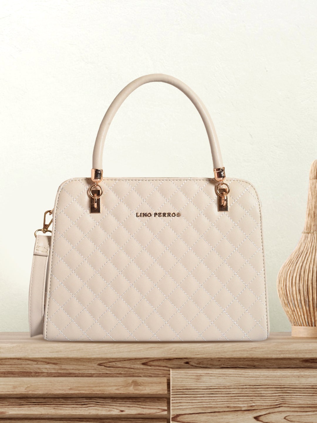 Lino Perros Off-White Quilted Handheld Bag Price in India